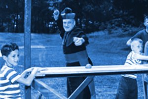 Cardinal Cushing playing ball with children